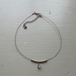 Elegant Gold and Silver Necklace with Crystal Pendant